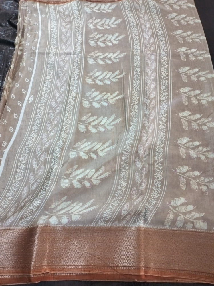 Rust leaf pattern semi silk saree with rich border