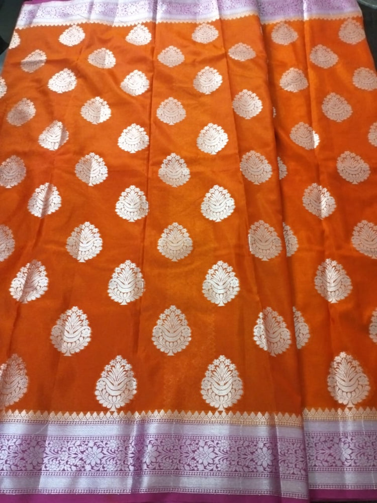Orange with Pink Georgette Banarasi saree with heavy silver border and big buttas all over saree