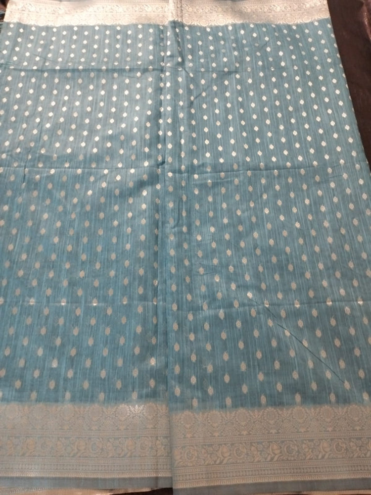 Blue with silver buties and heavy border semi silk saree