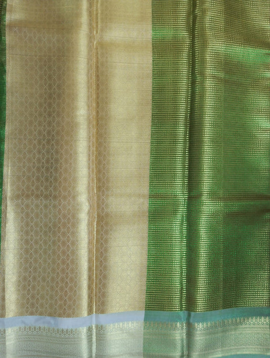 Golden Green semi kanchi tissue saree with brocade blouse
