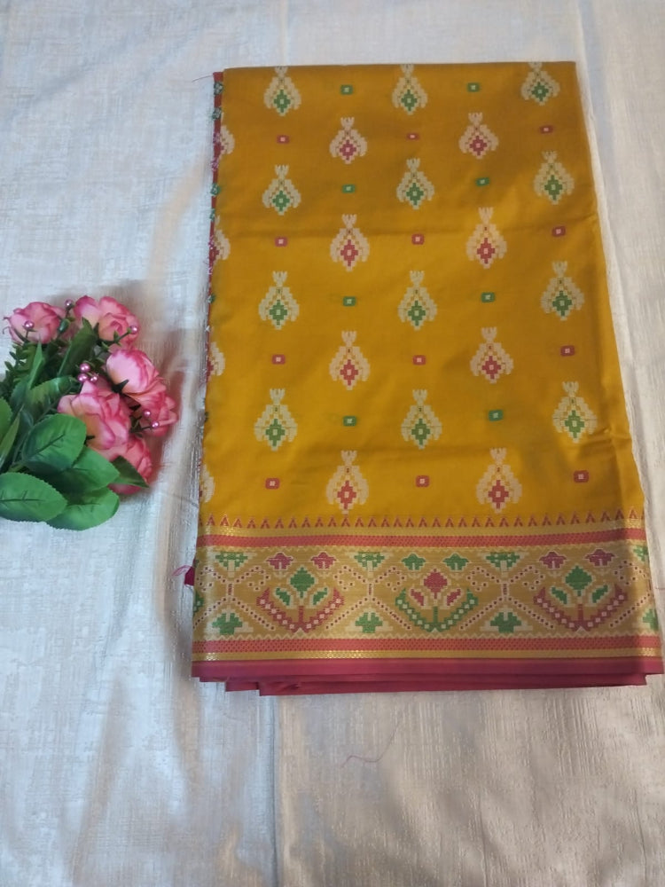 Mustard yellow ikkat pochampalli semi silk saree