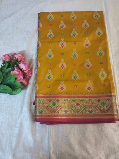 Mustard yellow ikkat pochampalli semi silk saree