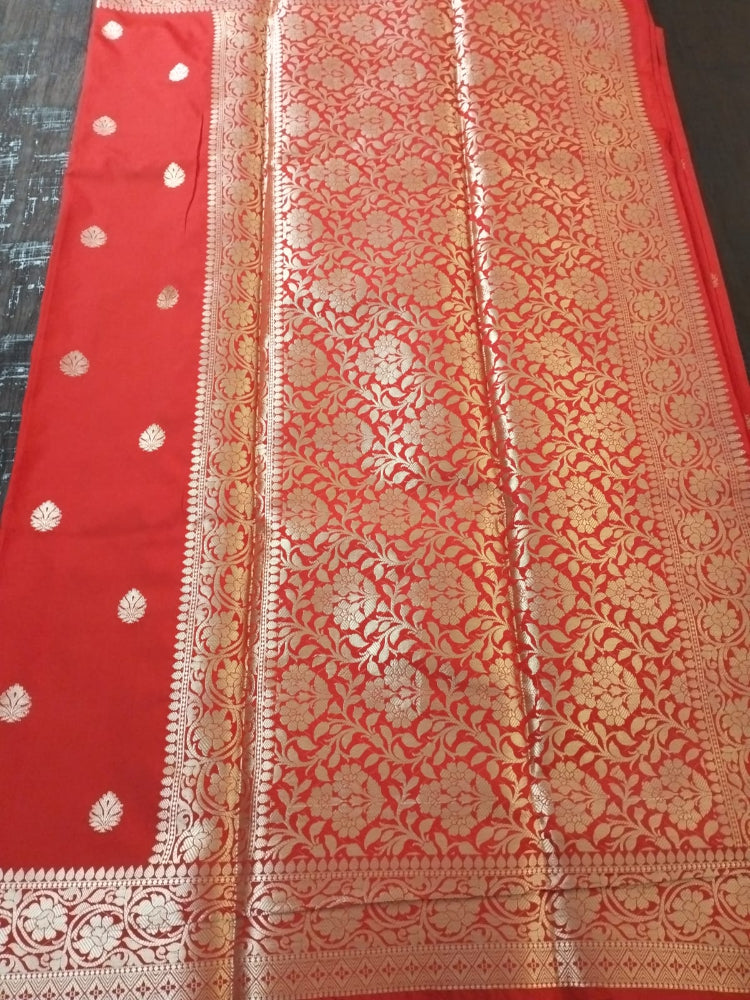 Red semi Katan with butas and heavy golden border Banarsi saree