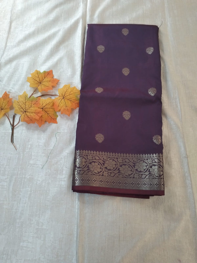 Purple semi katan with butas and heavy golden border banarasi saree