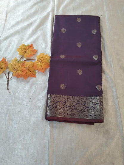 Purple semi katan with butas and heavy golden border banarasi saree
