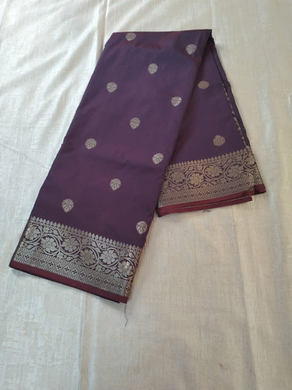 Purple semi katan with butas and heavy golden border banarasi saree