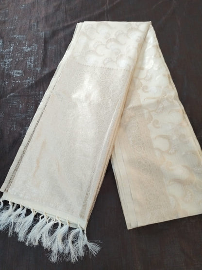 Off white with golden jaal self design semi silk saree