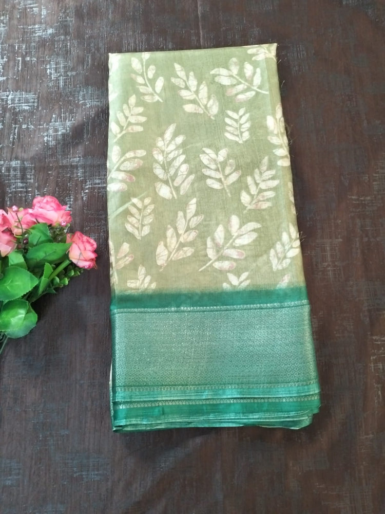 Olive green leaf pattern semi silk saree with rich border