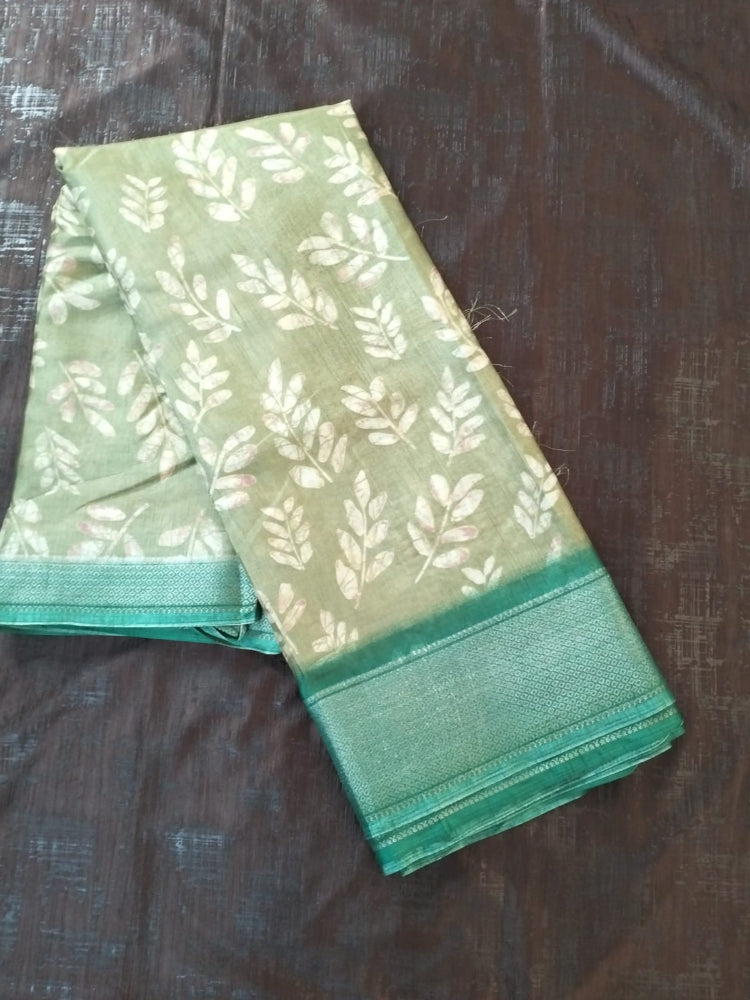 Olive green leaf pattern semi silk saree with rich border