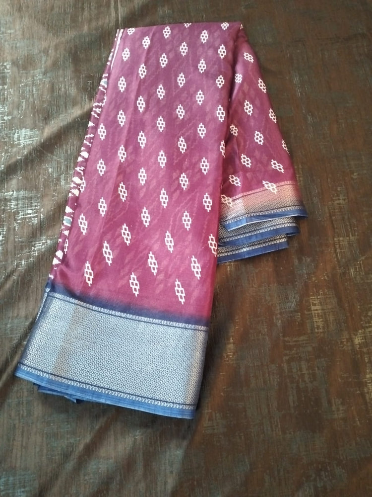 Maroon geometric design semi silk saree with rich blue border