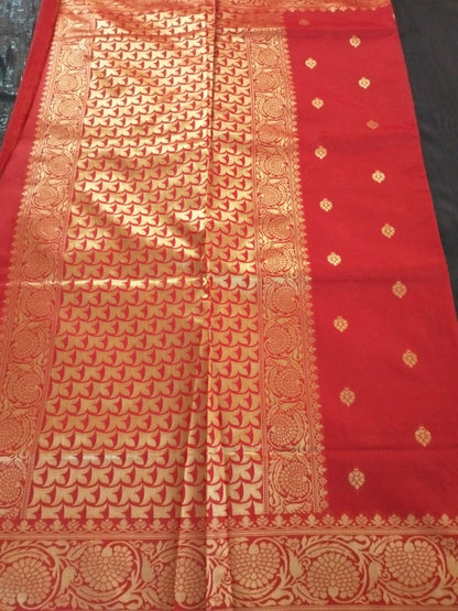 Red with heavy golden border with buttas lichee silk