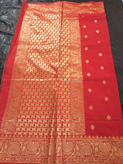Red with heavy golden border with buttas lichee silk