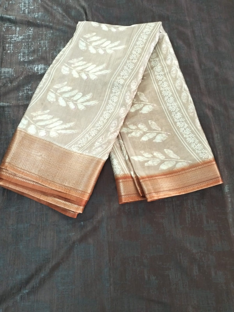 Rust leaf pattern semi silk saree with rich border