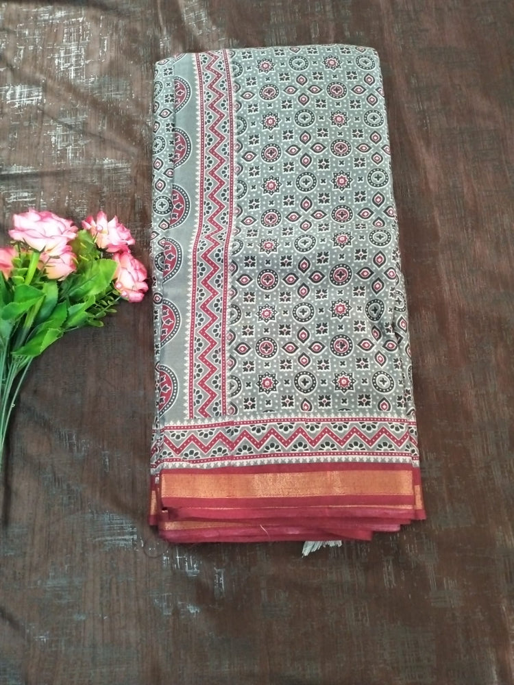 Grey with red and zari border design Cotton fancy Saree