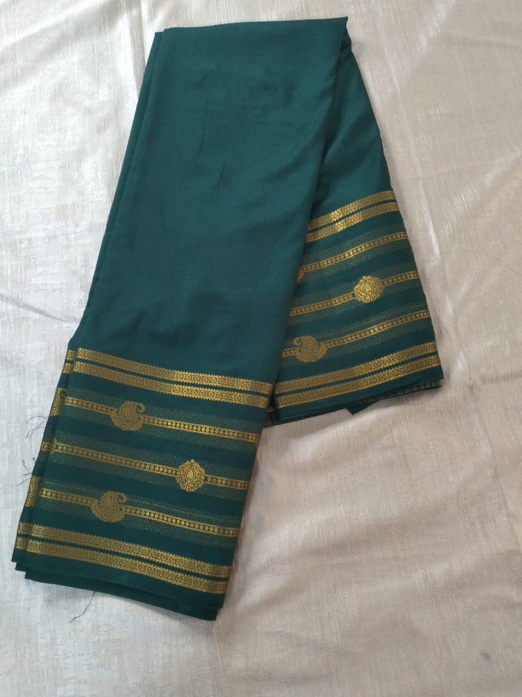 Bottle green colour with Golden line border Mysore Semi Crepe silk saree