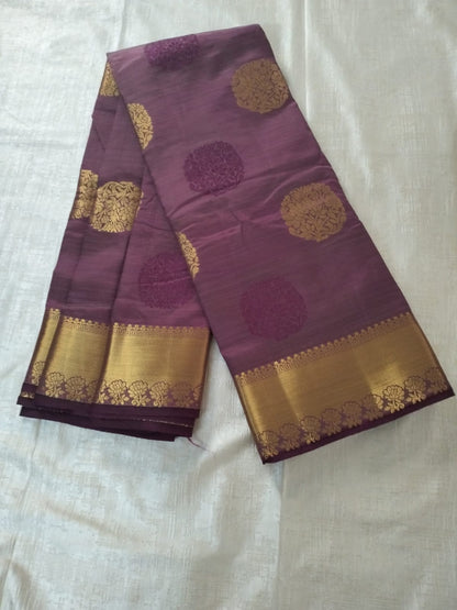Dark wine semi Banarasi silk with golden base pallu and big buttas