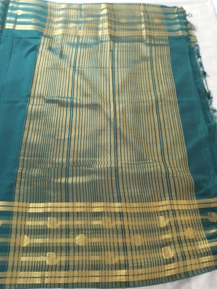 Bottle green colour with Golden line border Mysore Semi Crepe silk saree