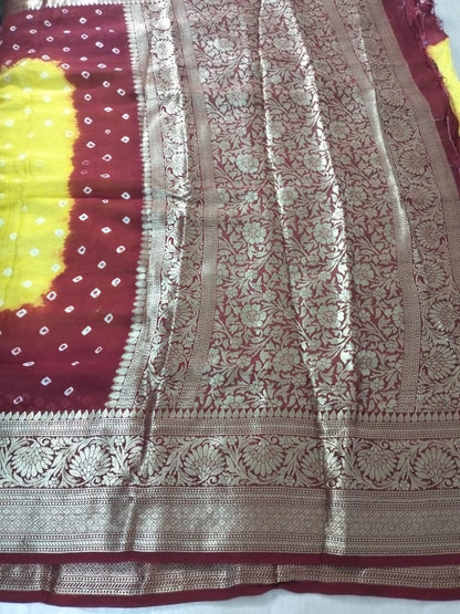 Yellow with Red bandhani soft silk with heavy golden border