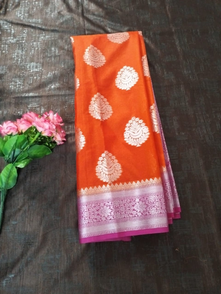 Orange with Pink  Georgette Banarasi saree with heavy silver border and big buttas all over saree