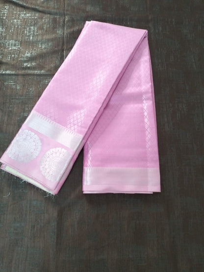 Pink with offwhite brocade blouse and heavy pallu semi silk
