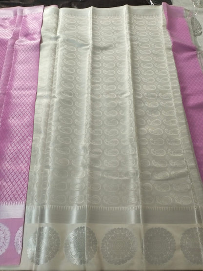 Pink with offwhite brocade blouse and heavy pallu semi silk