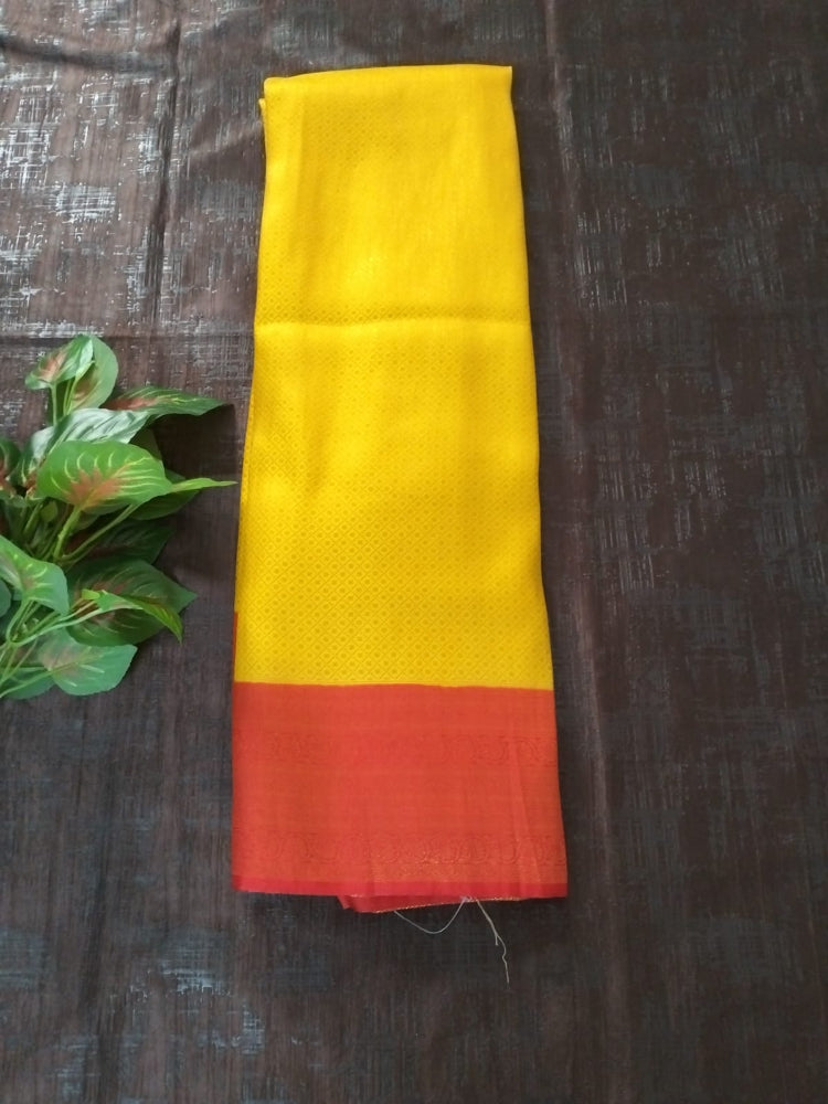 Yellow with red semi silk saree with golden self design