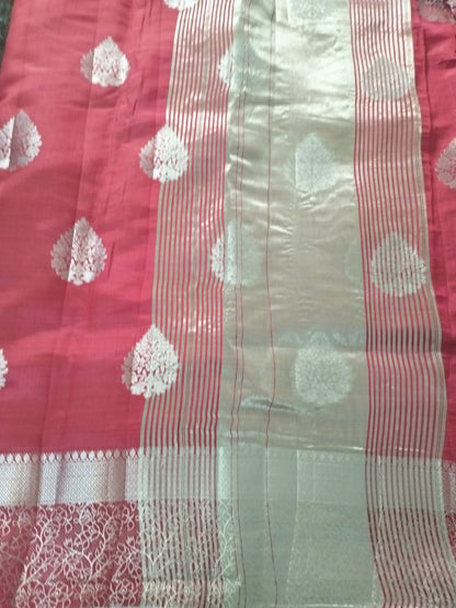Rani Pink semi benarasi silk with silver base pallu and big buttas