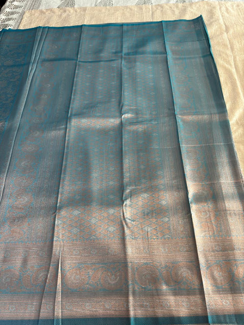 Blue with Rose gold colur  heavy  border semi silk saree
