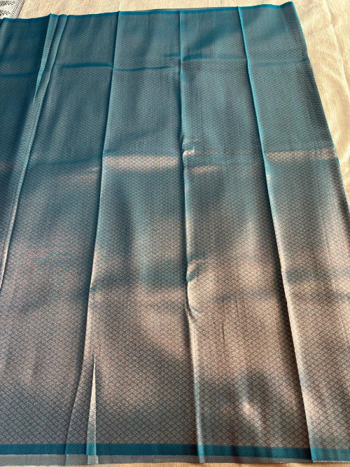 Blue with Rose gold colur  heavy  border semi silk saree
