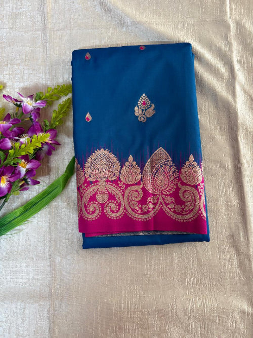 Blue with rani Pink base heavy border semi silk saree