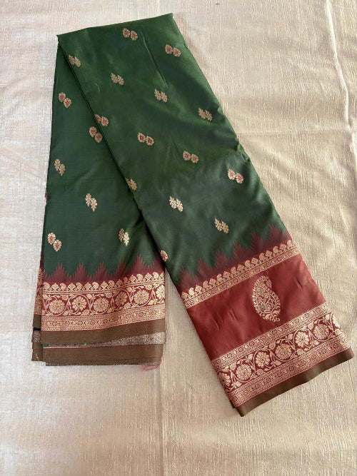 Green with Rust base heavy double border semi silk saree