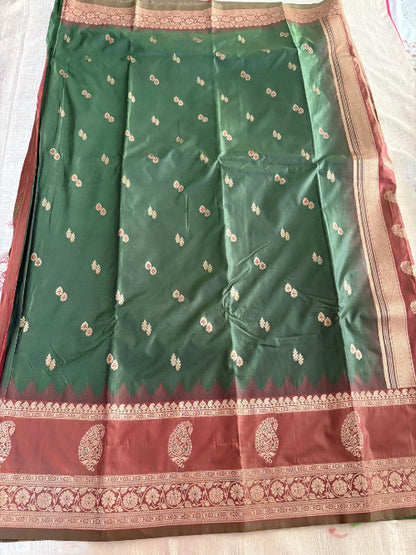 Green with Rust base heavy double border semi silk saree