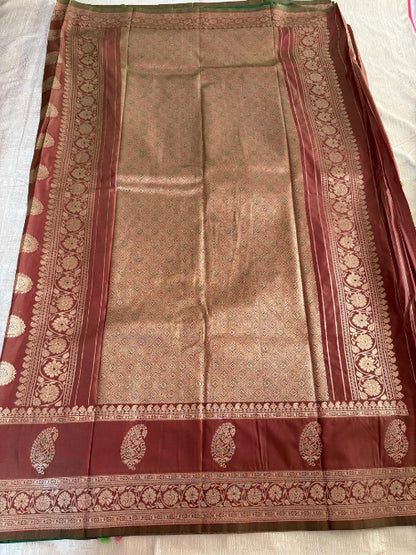 Green with Rust base heavy double border semi silk saree