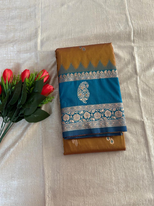 Mustard colur with blue base heavy double border semi silk saree