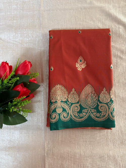 Rust with Green base heavy border semi silk saree