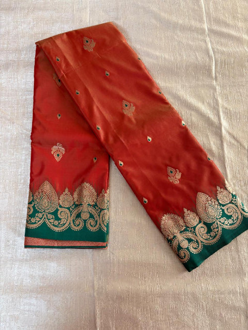 Rust with Green base heavy border semi silk saree