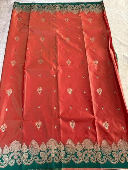 Rust with Green base heavy border semi silk saree